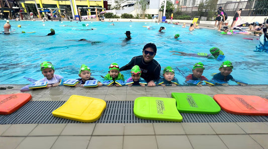 toddlers wearing Swimiki water socks at ActiveSG swimming lesson