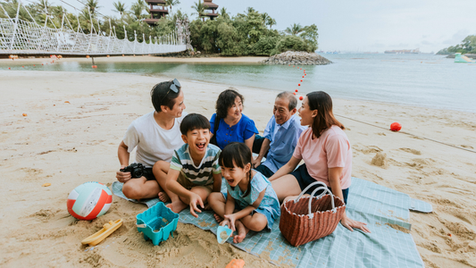 Family enjoying beach day with kids in Singapore”