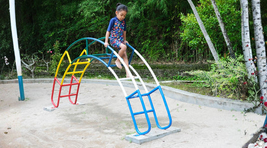 child wearing UPF 50 clothing playing outdoors