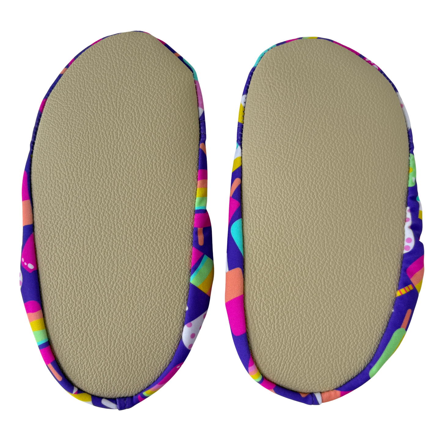 Pair of beige grip soles on a transparent background.