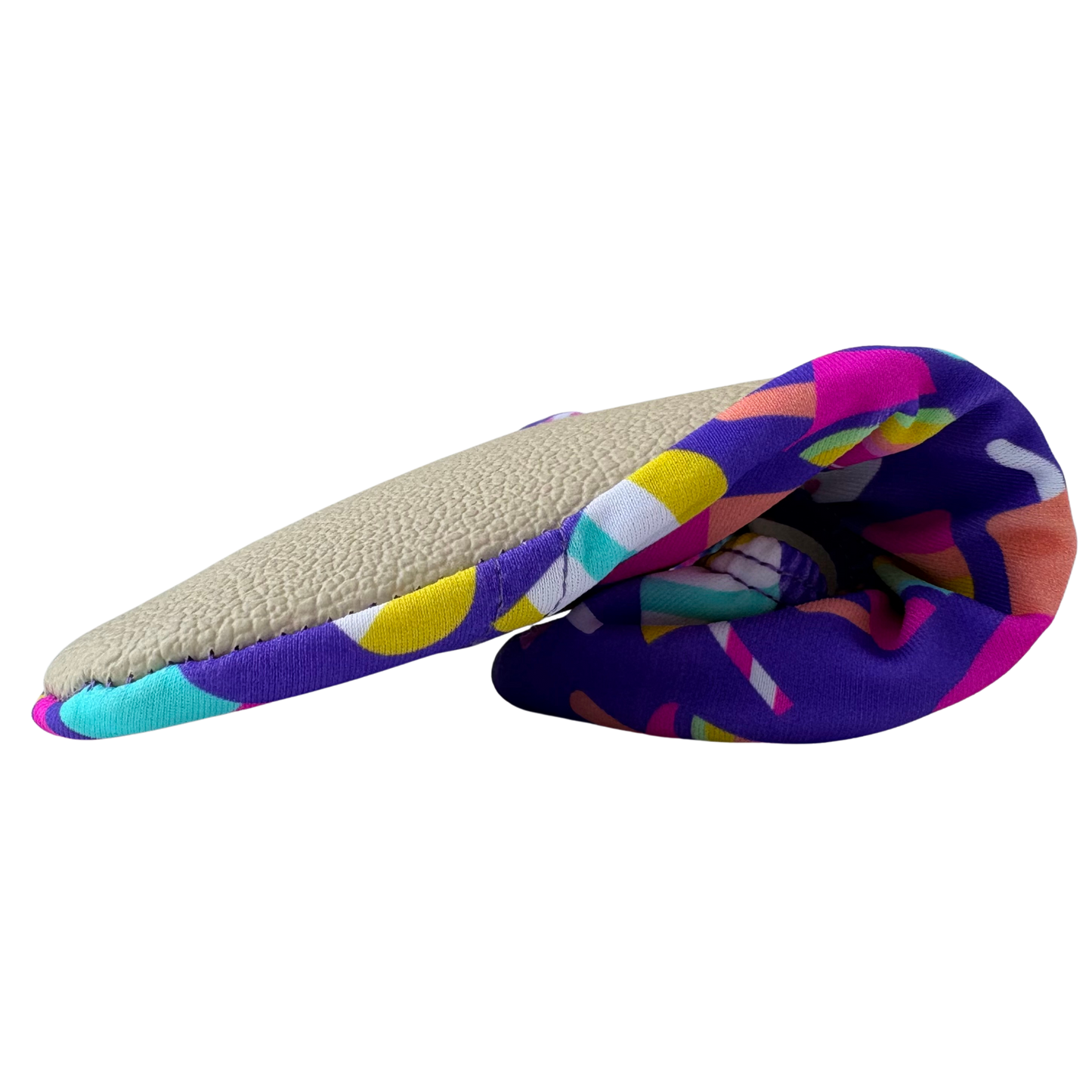 Folded non-slip water socks with colorful popsicle pattern and beige grip sole on a transparent background.