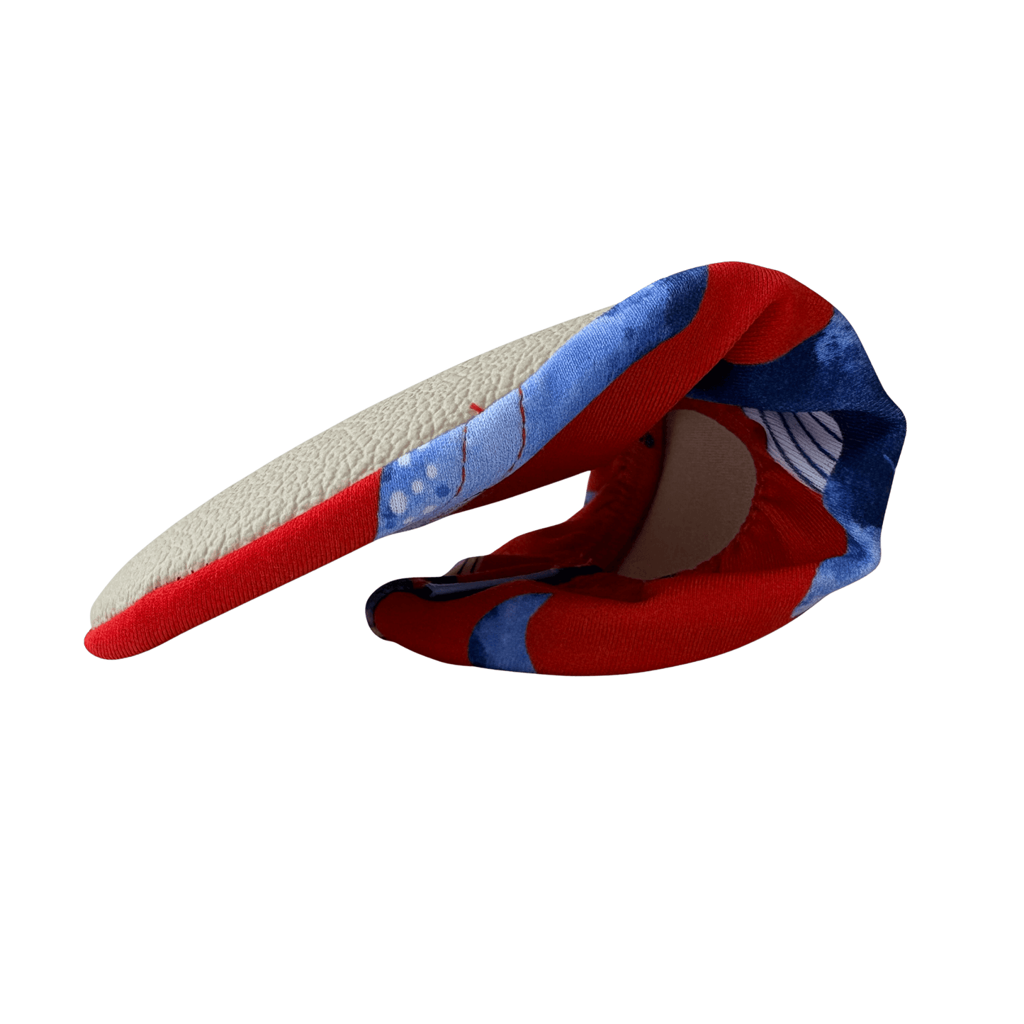 Folded non-slip water socks with red and blue pattern and beige grip sole on a transparent background.